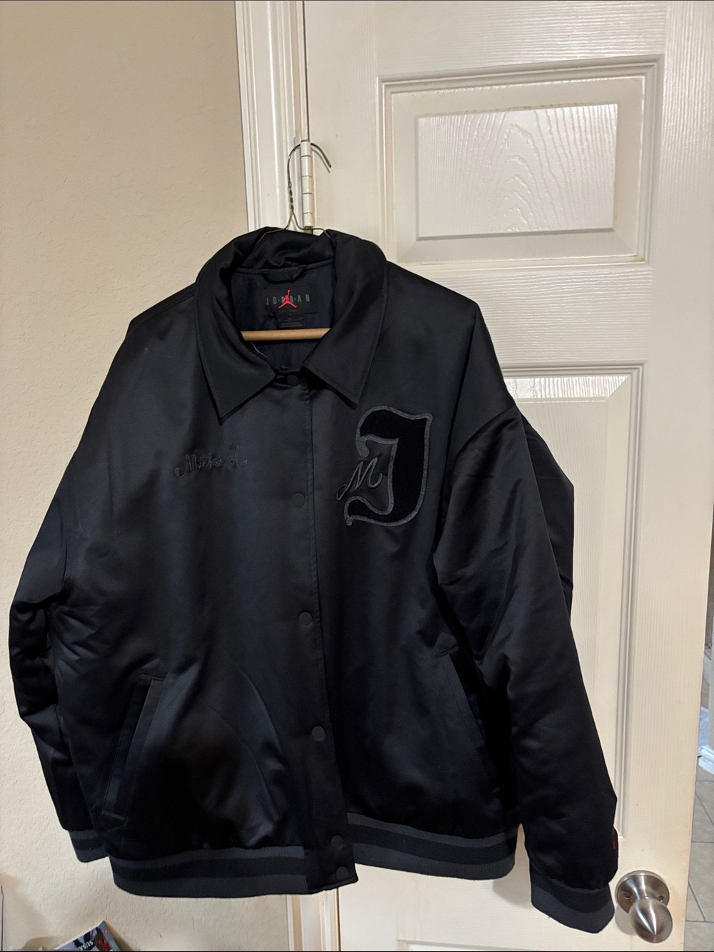 Jordan Women’s Black Satin Varsity Jacket